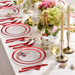 Clear red disposable dinnerware styled for a celebration