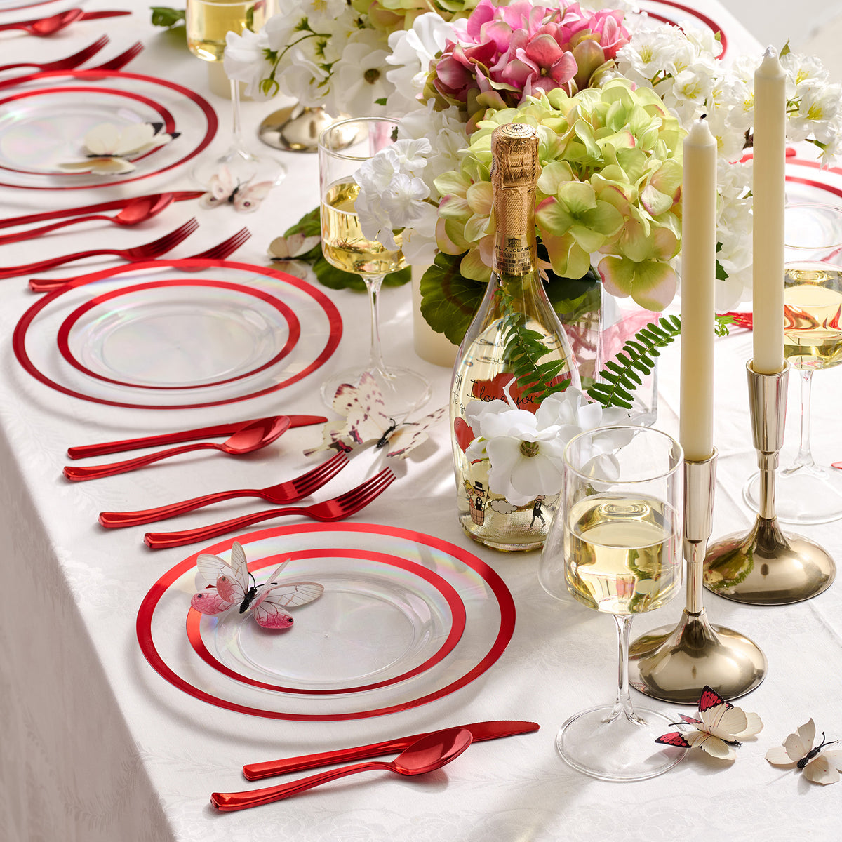 Clear red disposable dinnerware styled for a celebration